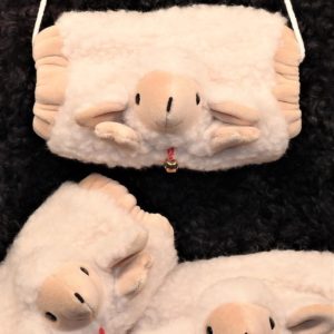 Muff mit Lammkopf